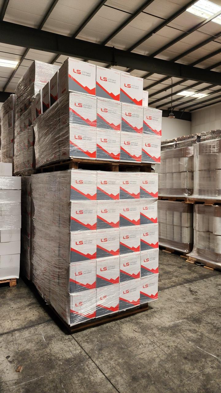 Lines Smart branded cartons and packaging rolls in the warehouse